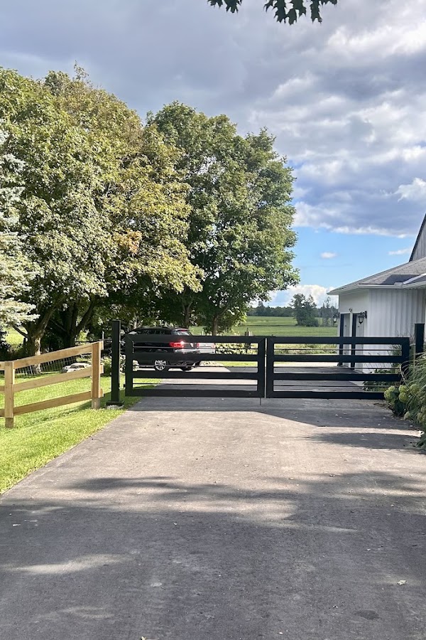 Sharon's installed black gate in daylight